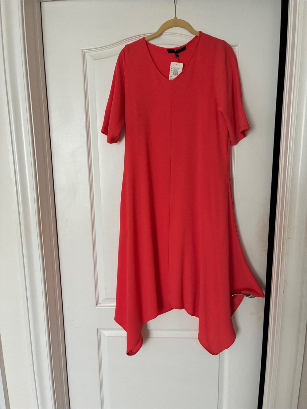 Elegant Coral V-Neck Midi Dress with Handkerchief Hem